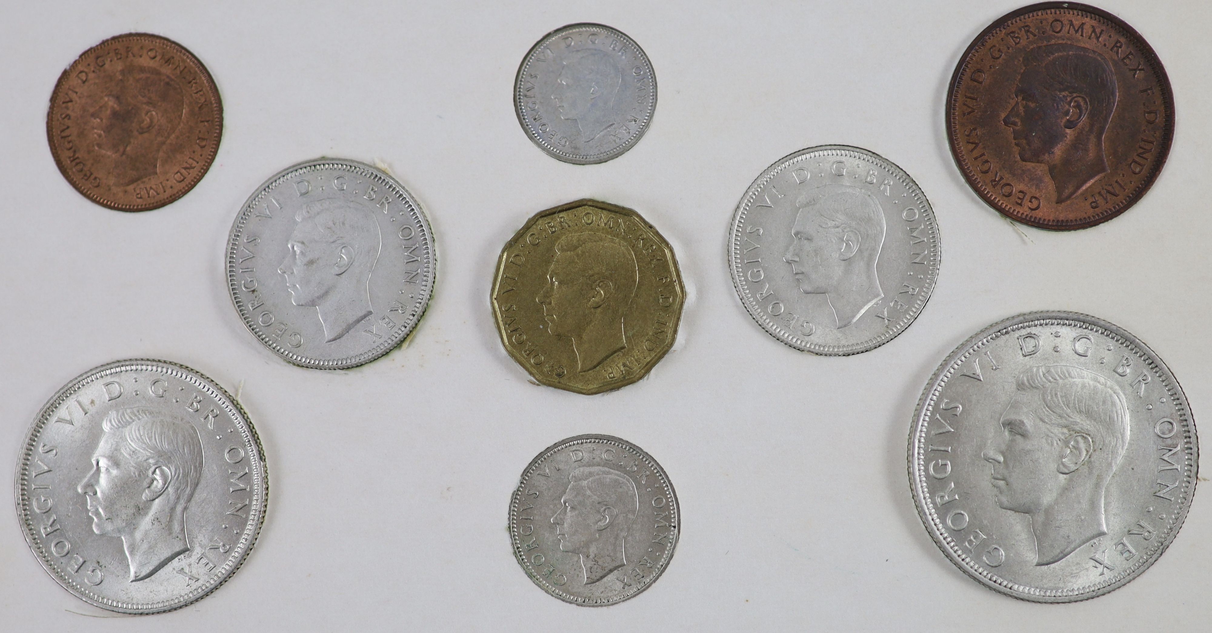 George VI specimen coin sets for 1938, 1939, 1940, 1941, 1942 and 1943, first coinage, the majority about EF or better